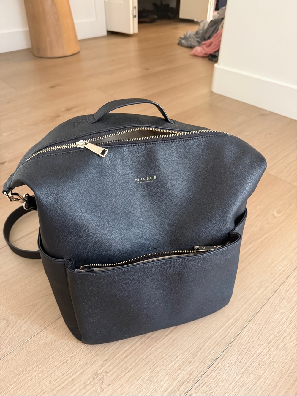 Mina Baie Stevie Midi Backpack in black and gold